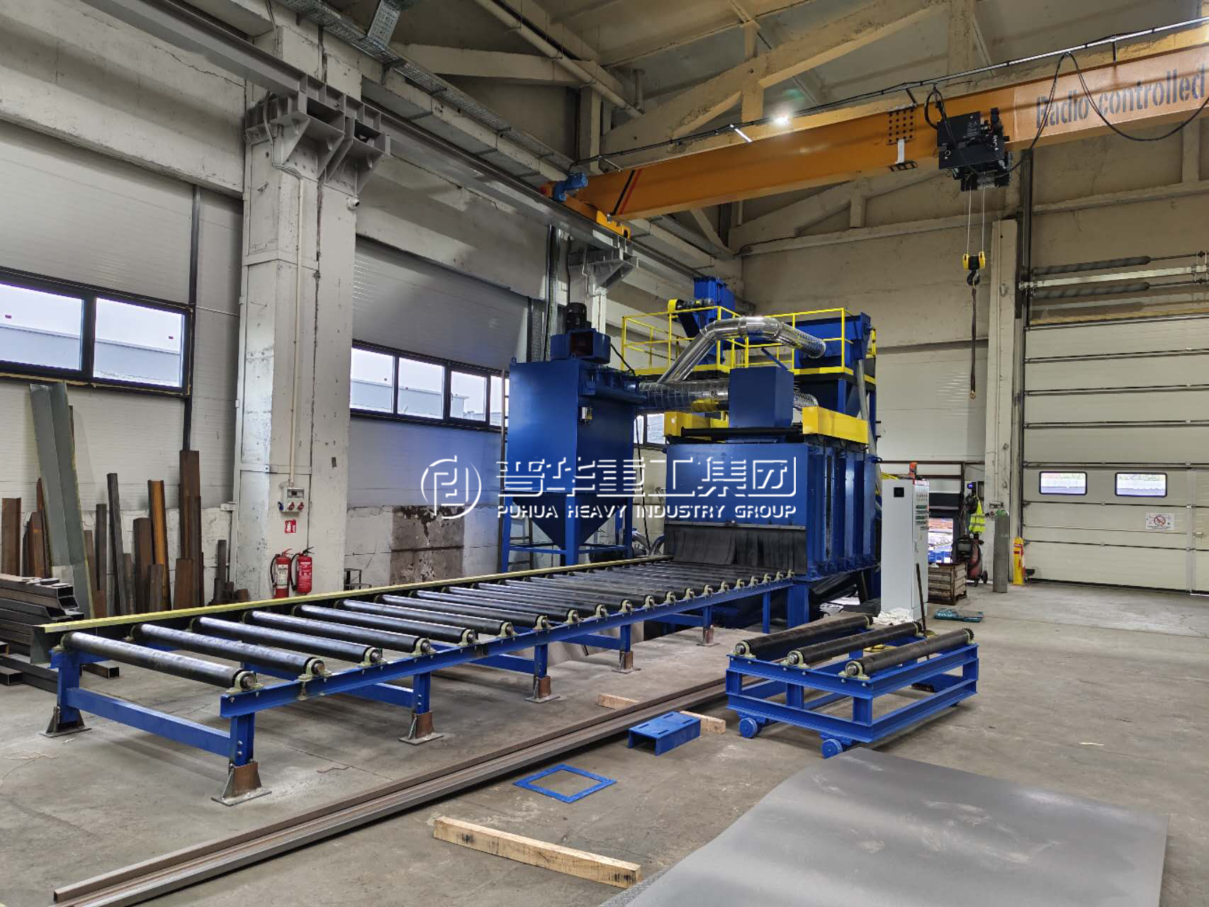 青島普華重工Q69系列鋼板型材拋丸清理機——高效表面處理的專業解決方案